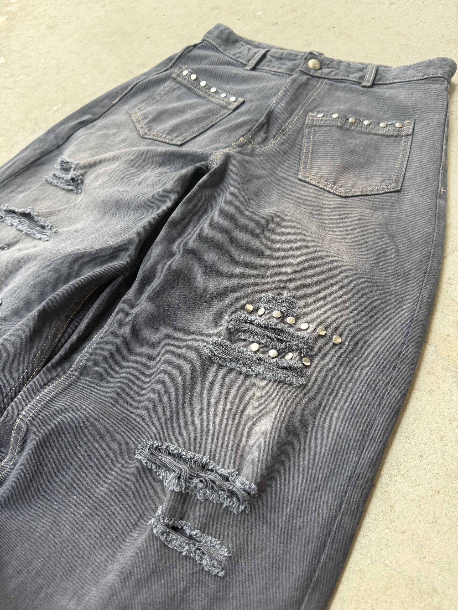LONCHO REPAIRED STUDDED DENIMS